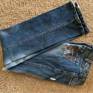 Used Cowgirl Tuff jeans in size 27x35.